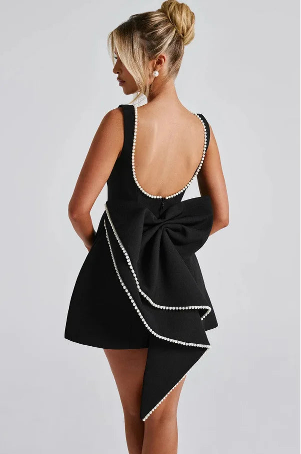 Vestido Curto com Laço de Pérolas e Costas Descobertas — foto 35 | Tolobasao