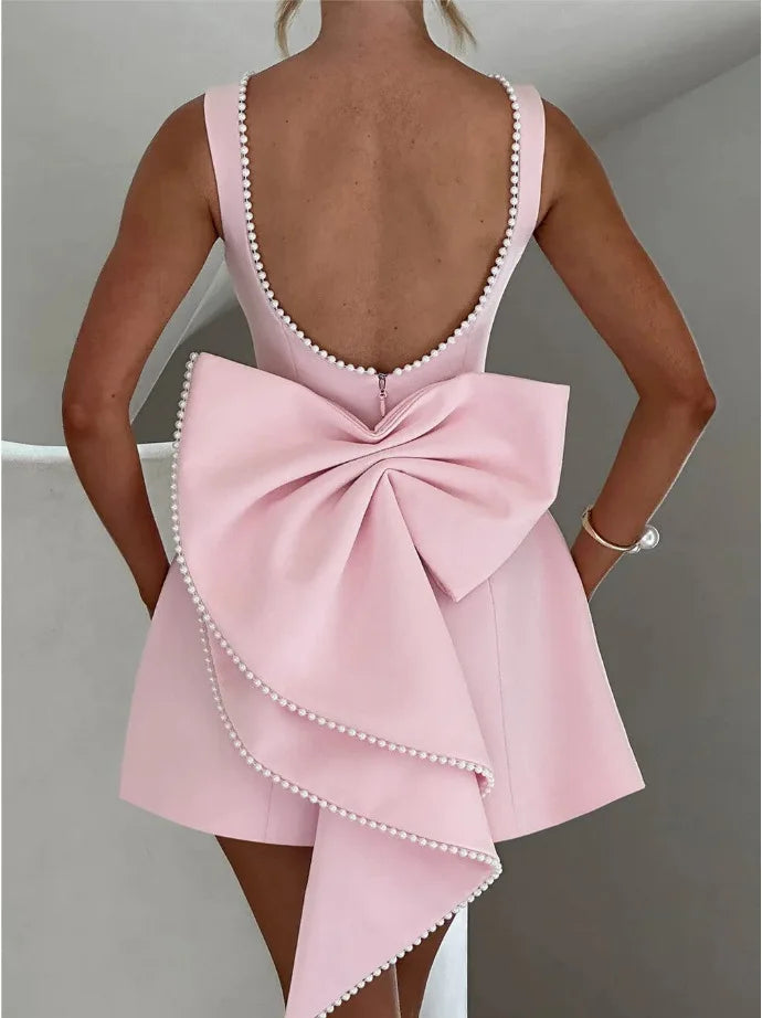 Vestido Curto com Laço de Pérolas e Costas Descobertas — foto 47 | Tolobasao