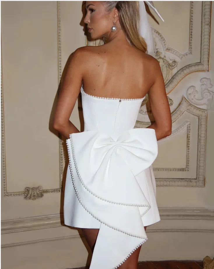 Vestido Curto com Laço e Pérolas — Rosa — foto 31 | Tolobasao