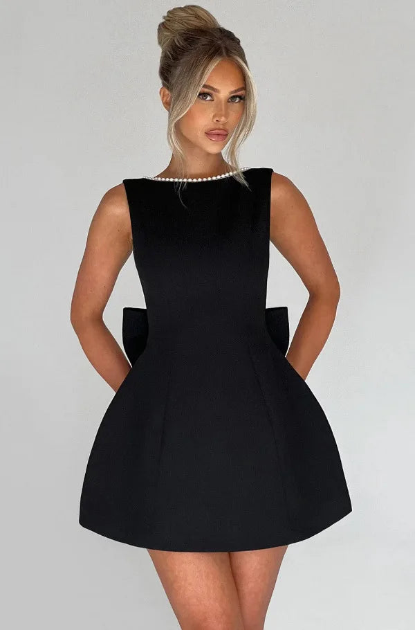 Vestido Curto com Laço e Pérolas — Rosa — foto 23 | Tolobasao
