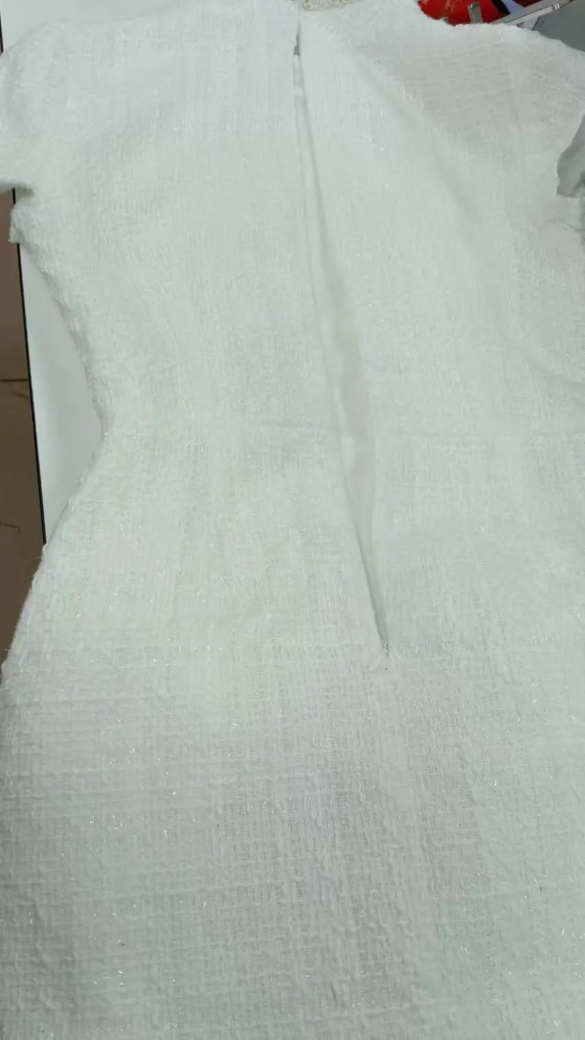 Vestido Curto em Tweed com Ombros Estruturados — foto 13 | Tolobasao