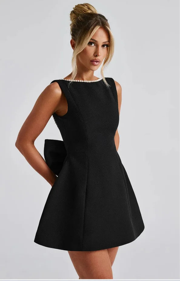 Vestido Curto com Laço e Pérolas — Rosa — foto 26 | Tolobasao