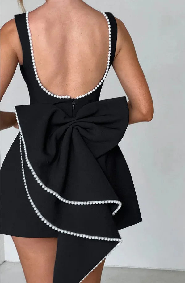 Vestido Curto com Laço e Pérolas — Rosa — foto 38 | Tolobasao