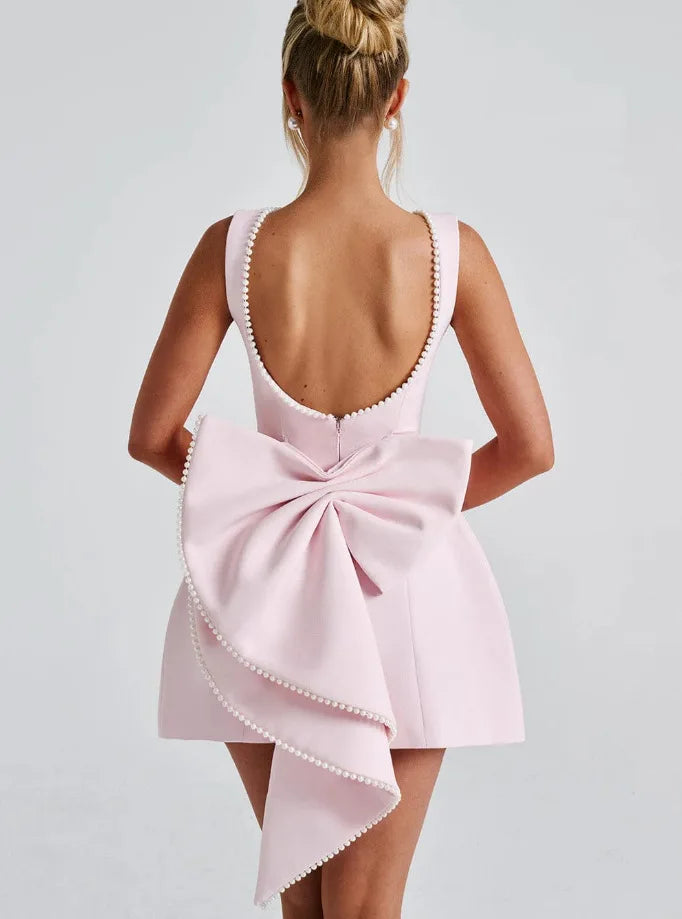 Vestido Curto com Laço de Pérolas e Costas Descobertas — foto 30 | Tolobasao
