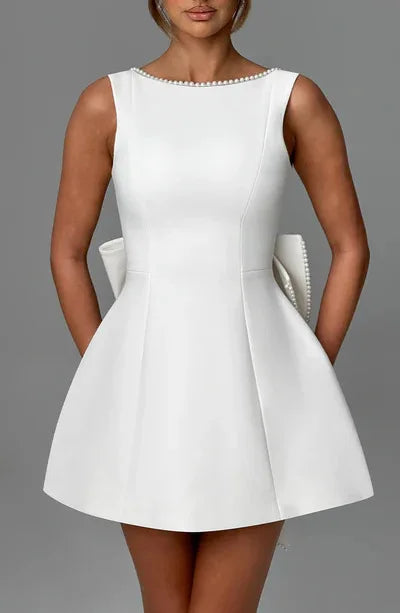 Vestido Curto com Laço e Pérolas — Rosa — foto 13 | Tolobasao