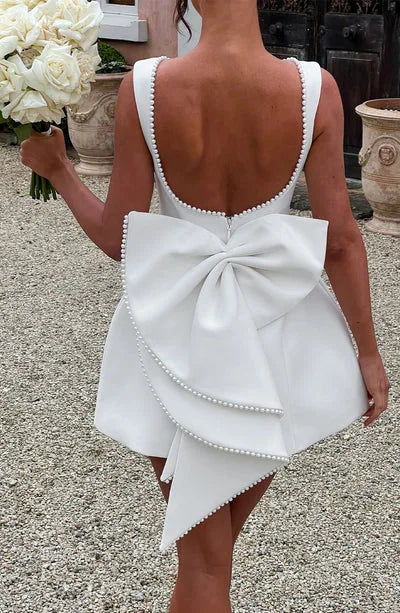 Vestido Curto com Laço de Pérolas e Costas Descobertas — foto 48 | Tolobasao