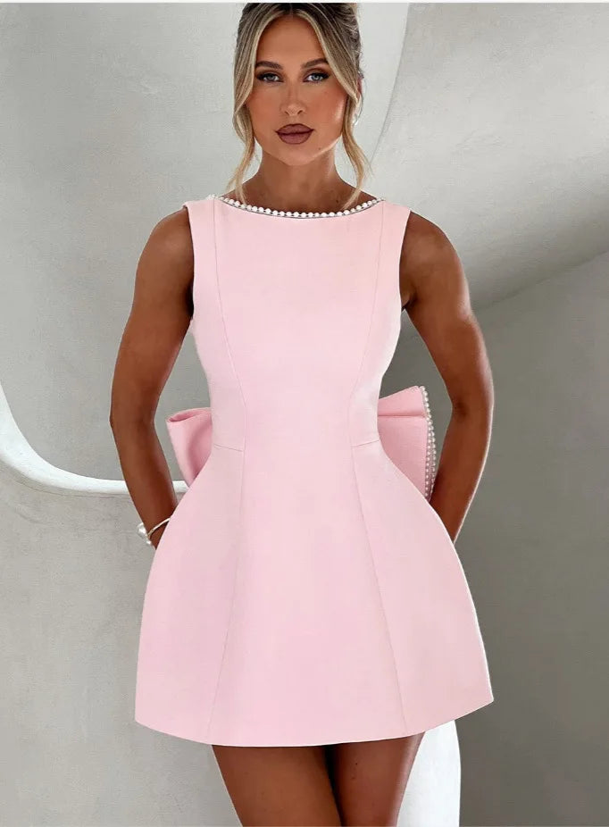 Vestido Curto com Laço e Pérolas — Rosa — foto 17 | Tolobasao