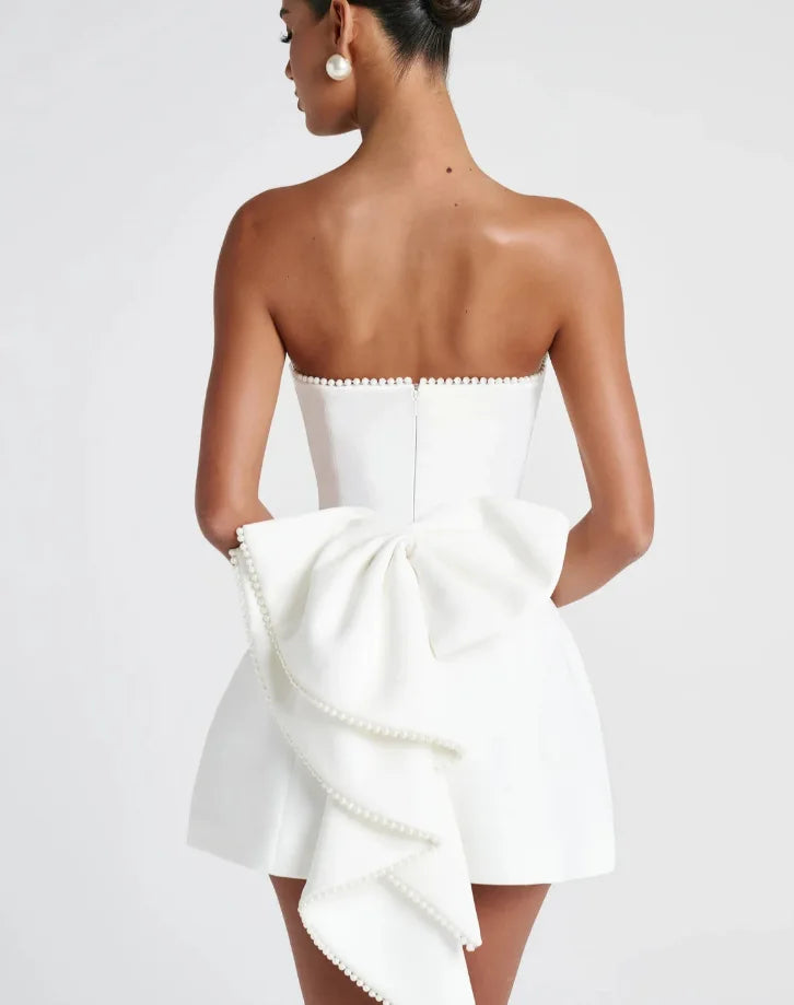 Vestido Curto com Laço e Pérolas — Rosa — foto 32 | Tolobasao
